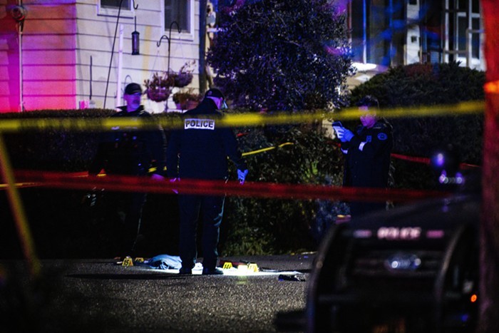 Police collect evidence shortly after a mass shooting in Northeast Portland on Saturday, February 19.