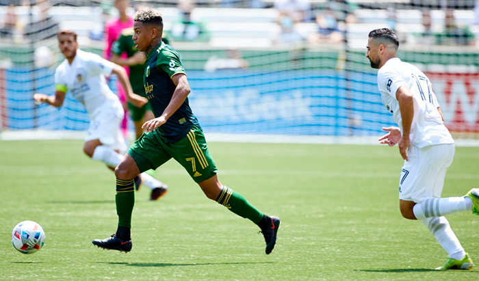 Andy Polo on the ball for the Timbers in a match against the LA Galaxy.