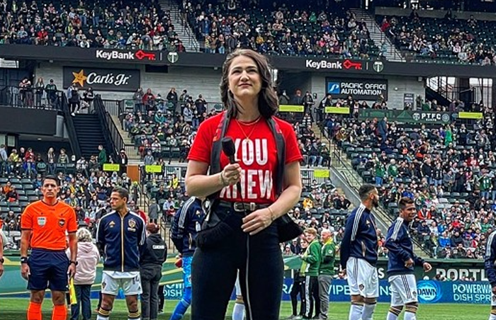 Madison Shanley sings the national anthem before the Portland Timbers match against the LA Galaxy on April 3 at Providence Park.